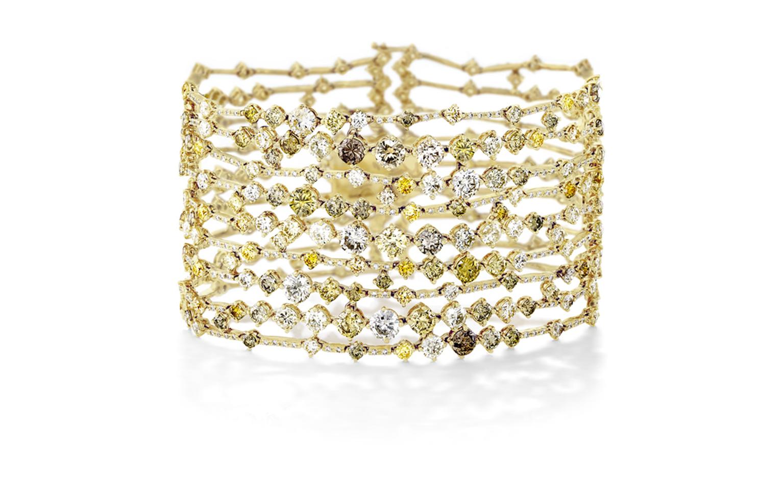 DE BEERS, Arpeggia collection, nine-lines bracelet in yellow gold. POA