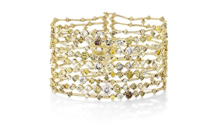 DE BEERS, Arpeggia collection, nine-lines bracelet in yellow gold. POA