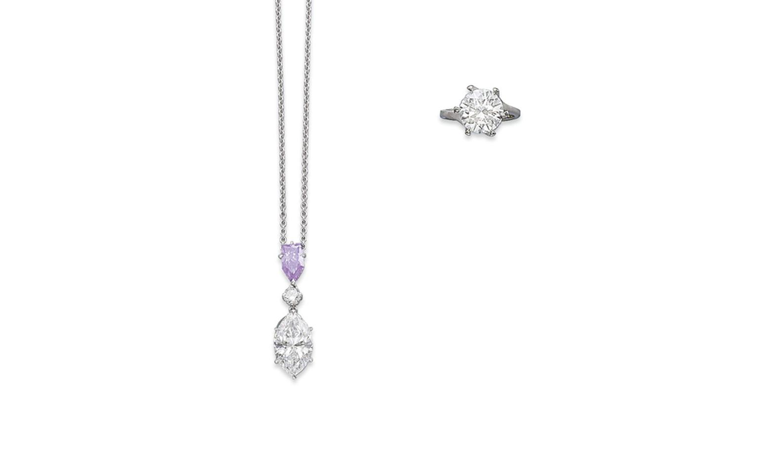 Lot 291. A coloured diamond pendant. The pendant set with a bullet-shaped fancy purple diamond, weighing 1.04 carat, suspending a brilliant-cut diamond and a marquise-cut diamond necklace. Estimate CHF 180,000 - CHF 220,000 SOLD FOR CHF 231,000