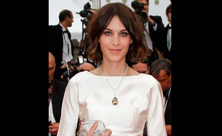 Alexa Chung wears an unusual 80.38 carat yellow-brown diamond pendant by Chopard on the red carpet at Cannes Film Festival 2011