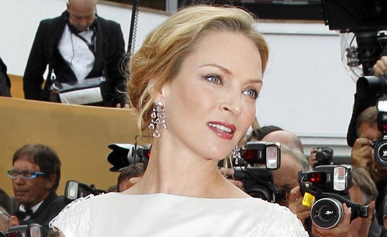 Uma Thurman, the American actress, member of the Jury, chose to wear a pair of 18ct white gold chandelier earrings set with diamonds with a matching diamond-set white gold bracelet.