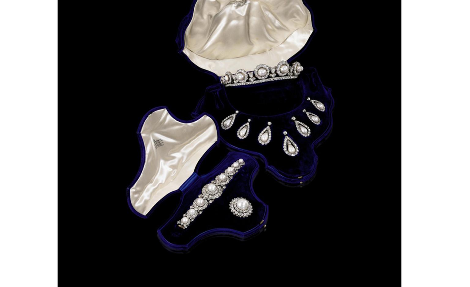 The Rosebery natural pearl and diamond tiara, bracelet and brooch in their case and demonstrating how the seven pearls can be detached from the tiara.