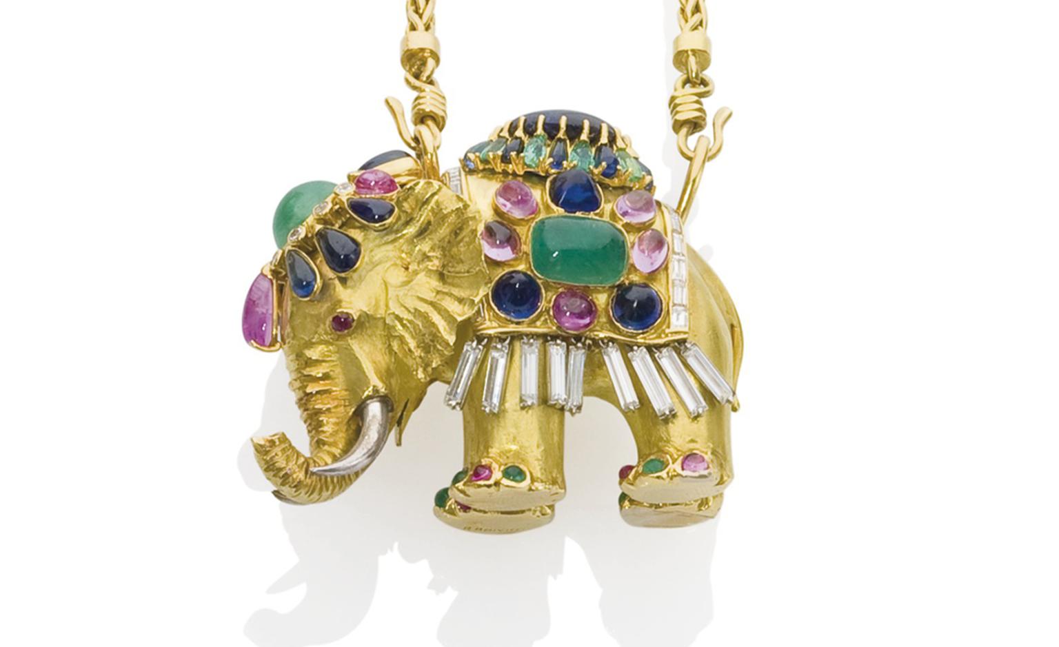 Lot 323, Gold elephant pendant by Rene Boivin, decorated with sapphires, emeralds and diamonds. Estimate €20,000 - €30,000. SOLD FOR €109,000