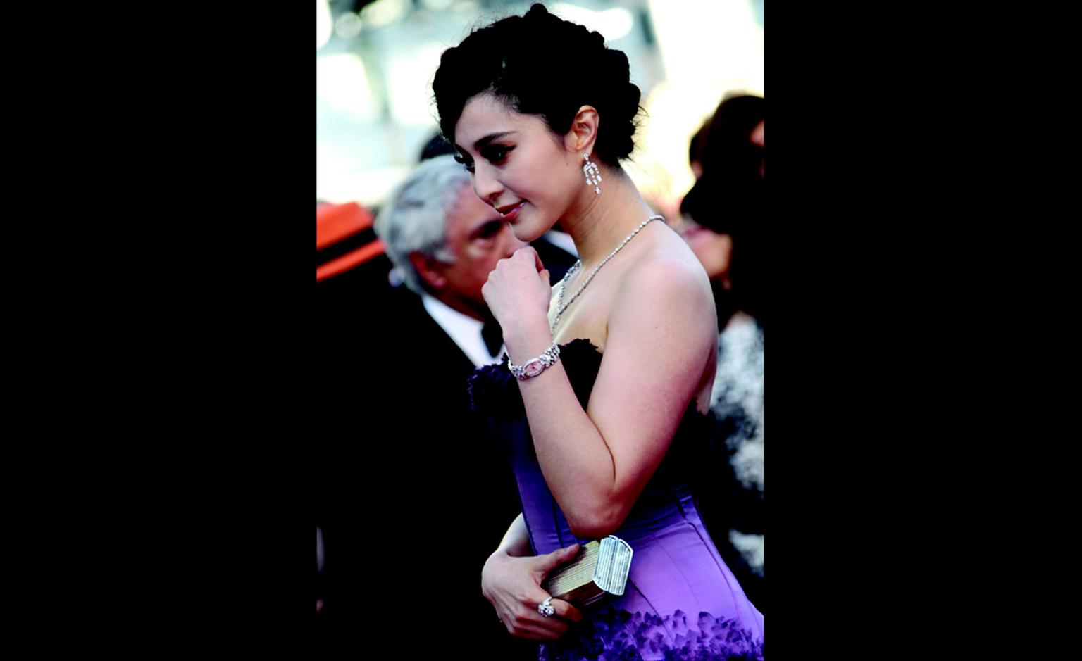 CANNES, FRANCE - MAY 15:  Actress Fan Bingbing with Cartier jewelry attends "The Artist" Premiere at the Palais des Festivals during the 64th Cannes Film Festival on May 15, 2011 in Cannes, France.  (Photo by Tony Barson/WireImage)