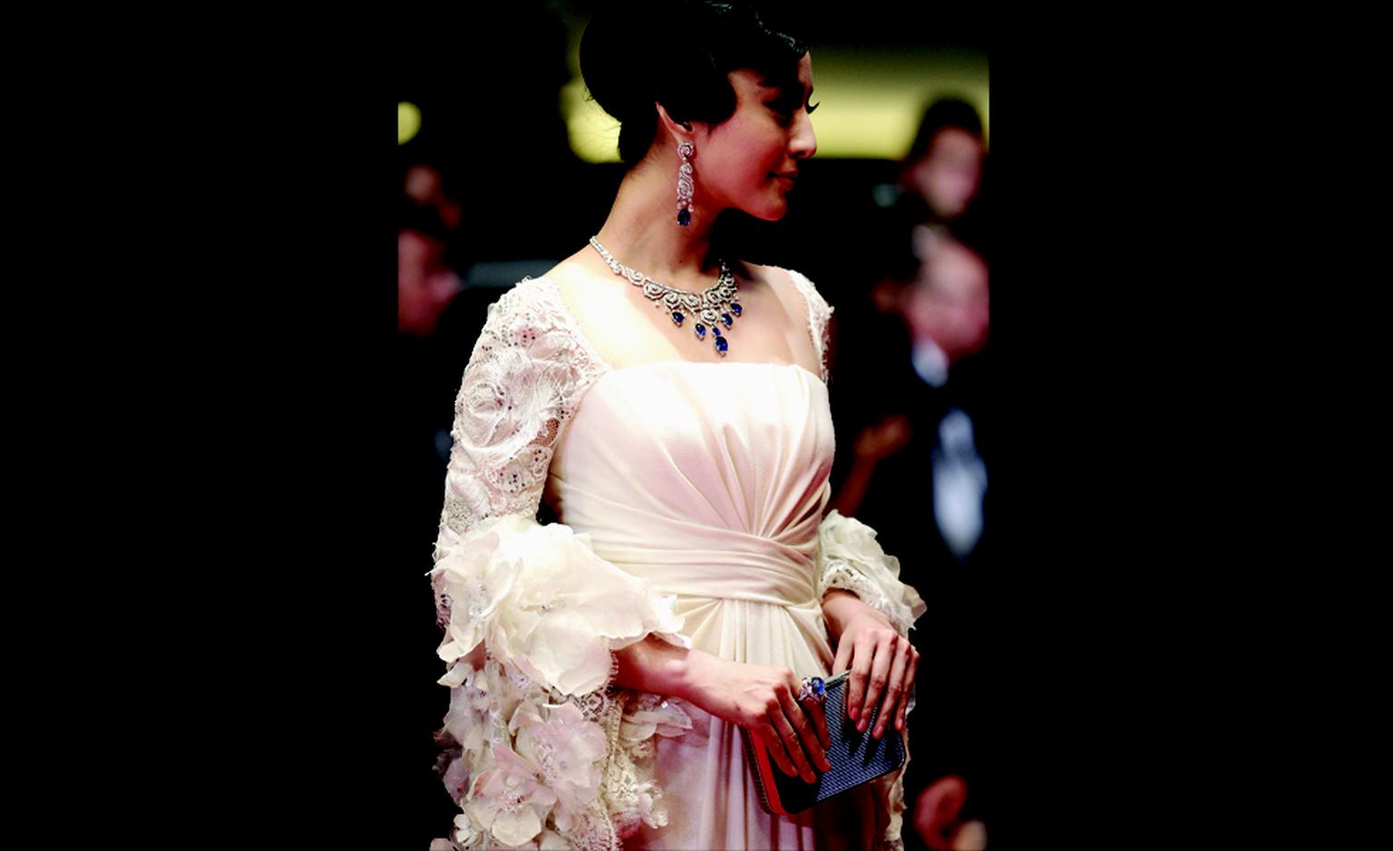 CANNES, FRANCE - MAY 13:  Fan Bing Bing with Cartier jewelry attends the "Polisse" premiere at the Palais des Festivals during the 64th Cannes Film Festival on May 13, 2011 in Cannes, France.  (Photo by Andreas Rentz/Getty Images)