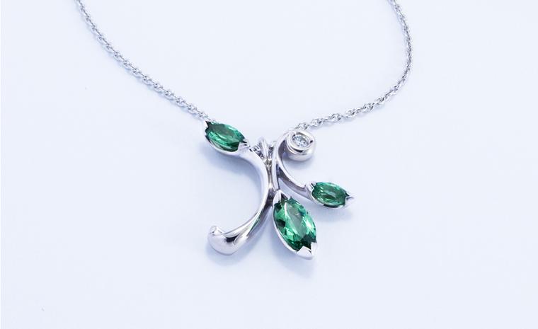 JON DIBBEN, Floral pendant set with tsavorites garnets and diamonds