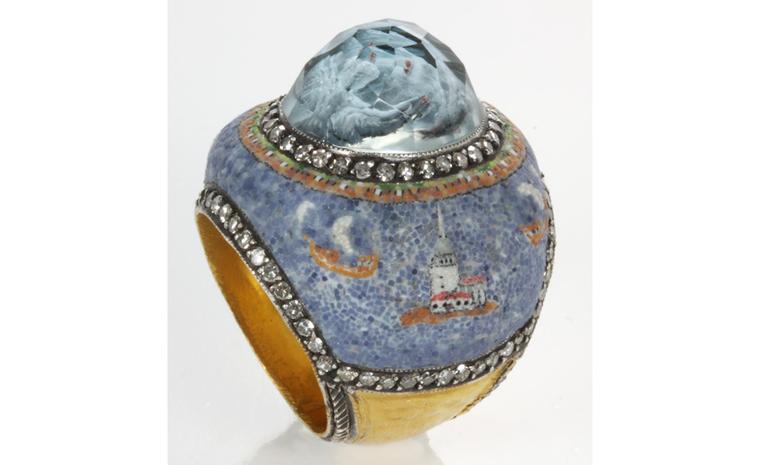 This Sevan Biçakçi ring is topped by two doves floating in a quartz dome, hovering over a maritime micromosaic scene of Istanbul.