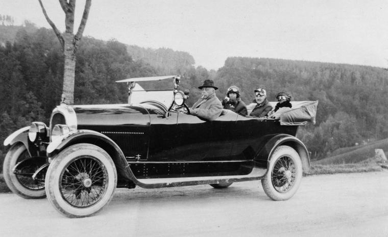 The Heuer family out and about in their automobile.