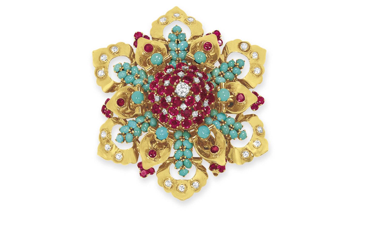 Lot 10. A diamond, ruby, turquoise and gold brooch, by John Rubel Co. Estimate 3,000 - 5,000 U.S. dollars