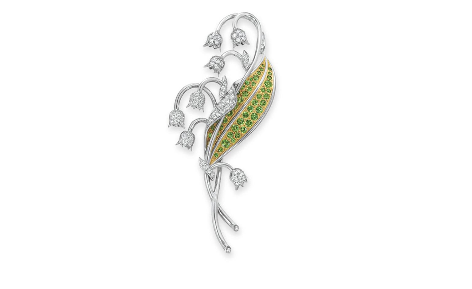 Lot 123. A diamond and tsavorite garnet ''Lilly of te Valley'' brooch, by Tiffany & Co. Estimate 3,000 - 5,000 U.S. dollars. SOLD FOR $8,125