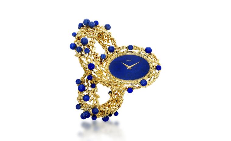 Piaget 1971 cuff watch in yellow gold with lapis lazuli dial and lapis lazuli beads with ultra-thin hand wound movement. Piaget Private Collection.