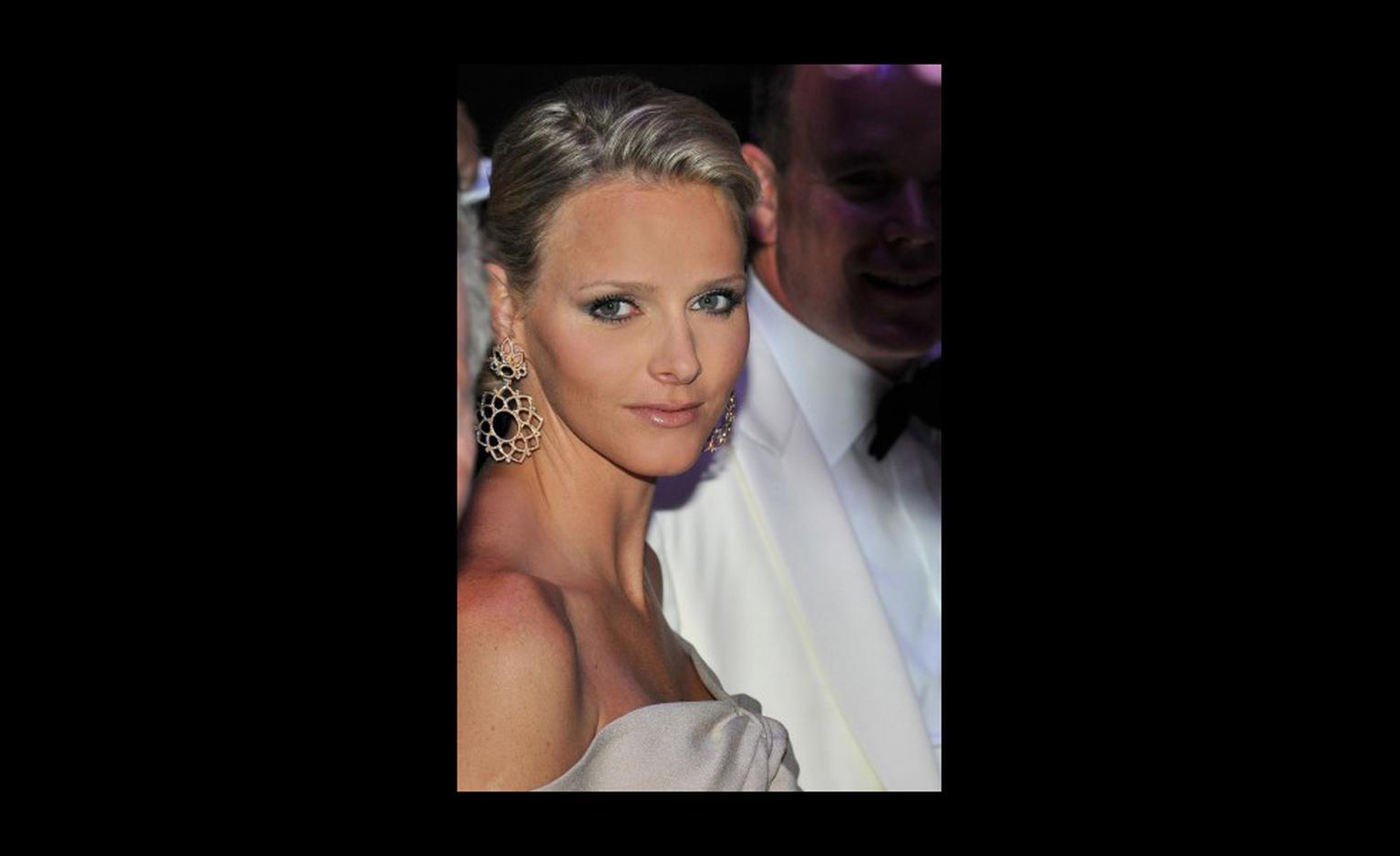 Big earring statement from Charlene Wittstock. I like the way she wears just the earrings and avoids the Christmas tree look. Photo: Prince's Palace of Monaco