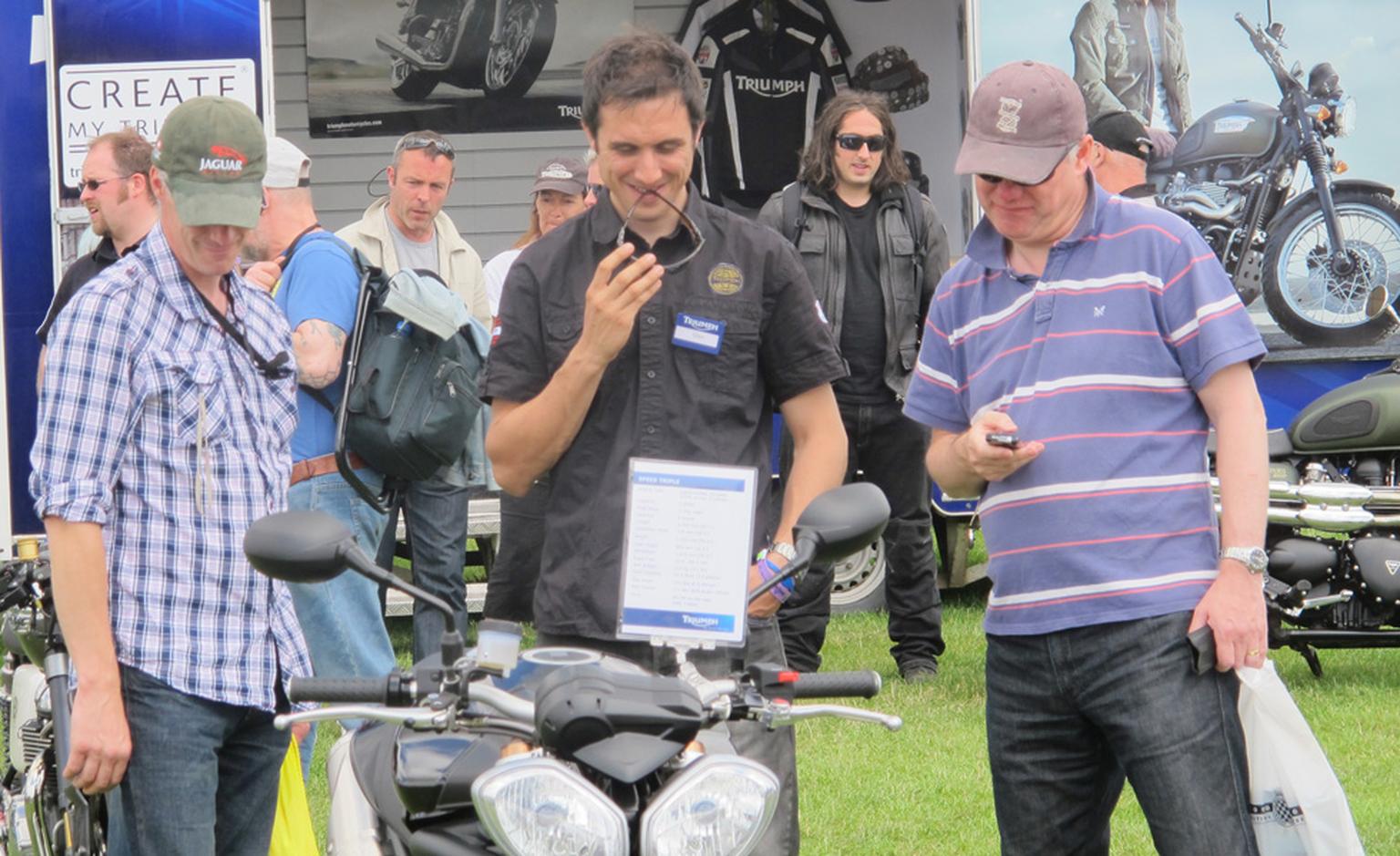 The typical pose of most men at Goodwood: heads down, eyes on chrome and lots of 'phwerrr' sounds.