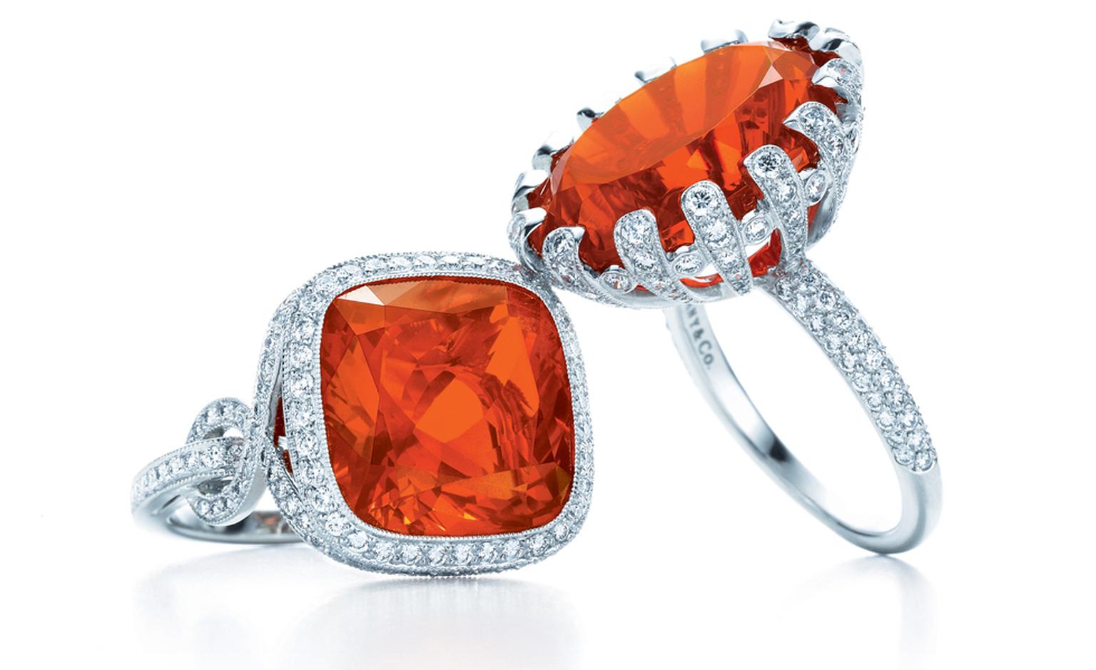TIFFANY & CO. Cushion-cut fire opal in knot ring set in platinum oval fire opal in petals ring with diamonds set in platinums. POA