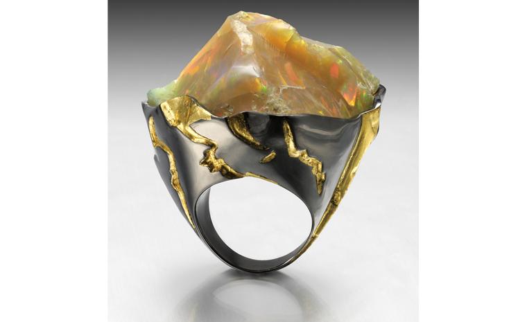 Ornella Iannuzzi: Mount Zion Ring. Made from a 65 cts rough Wello opal set in black silver and decorated with 24ct gold leaves. Unique piece. Model pictured sold - on commission from £2,500.