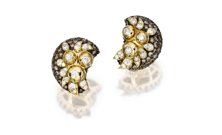 Lot 285 Cooperman & T. &co. 18 Karat Gold Silver Diamond and Colored Diamond Earclips. Est. $ 5/7,000